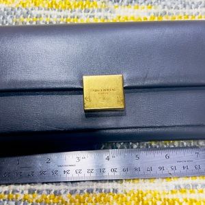 Saint Laurent wallet 
Calfskin Bellechasse Flap Clutch Wallet